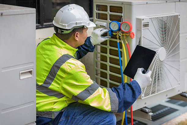 Professional Heat Pump Repair technician working in Neshanic Station, NJ